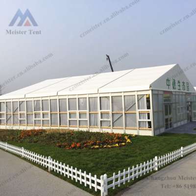 Big outdoor event tent decorated with cassette flooring